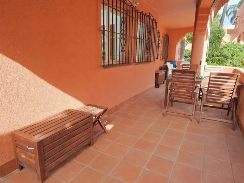 Fantastic, spacious and bright seaside elevated ground floor corner apartment, in a beachfront residential complex, located on one of the best beaches in Marbella. It features a large, very pleasant terrace that surrounds the entire property, perfect for 