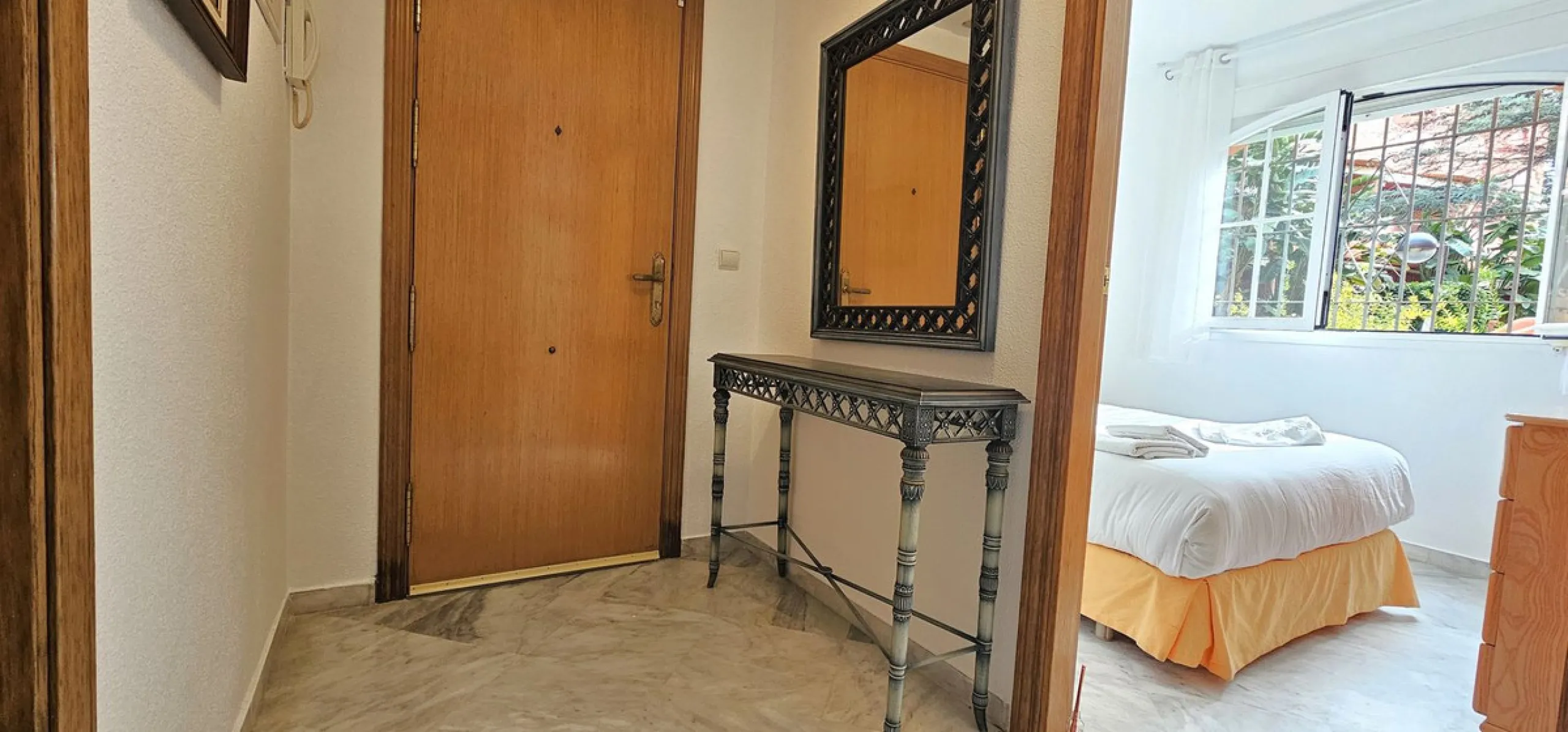 Fantastic, spacious and bright seaside elevated ground floor corner apartment, in a beachfront residential complex, located on one of the best beaches in Marbella. It features a large, very pleasant terrace that surrounds the entire property, perfect for 