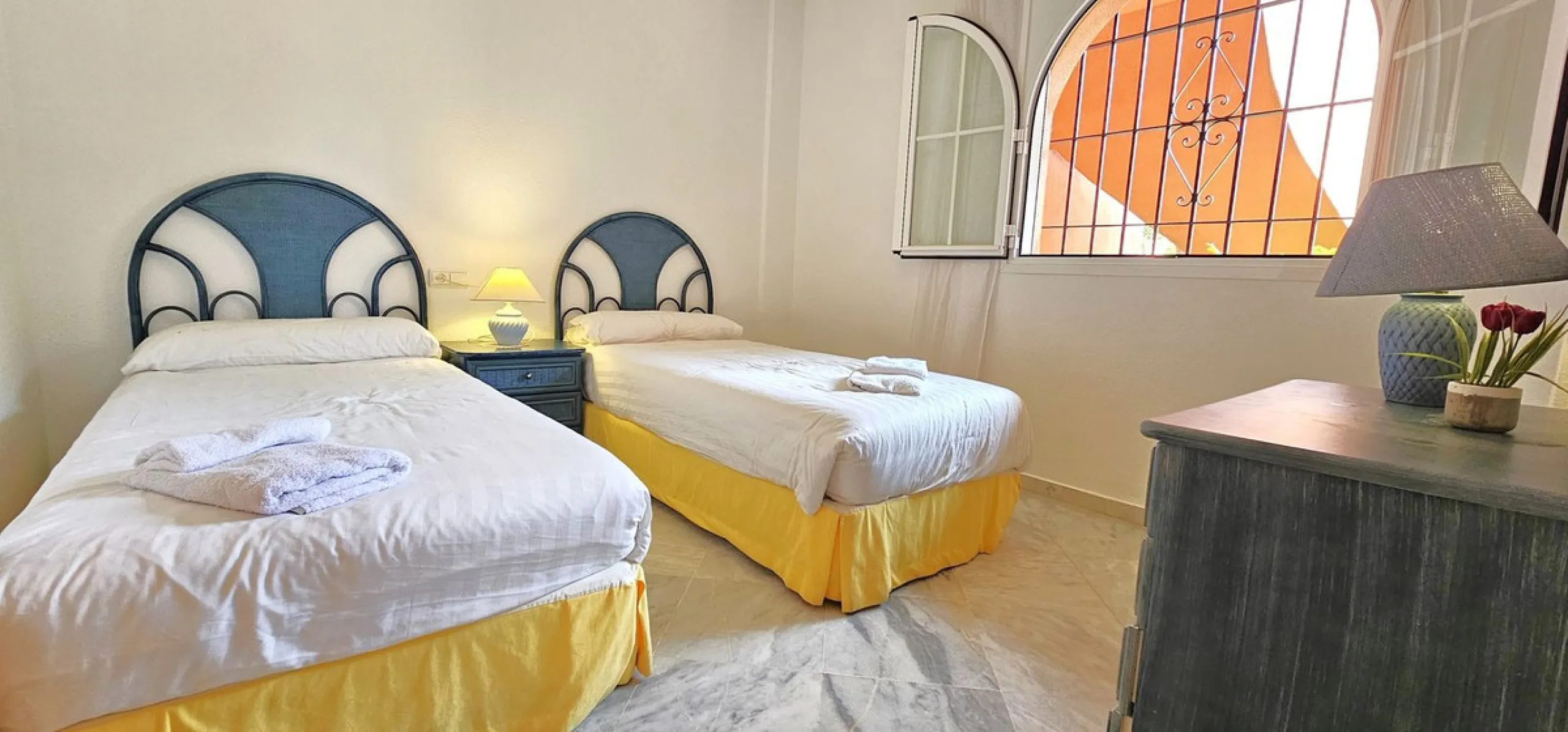 Fantastic, spacious and bright seaside elevated ground floor corner apartment, in a beachfront residential complex, located on one of the best beaches in Marbella. It features a large, very pleasant terrace that surrounds the entire property, perfect for 