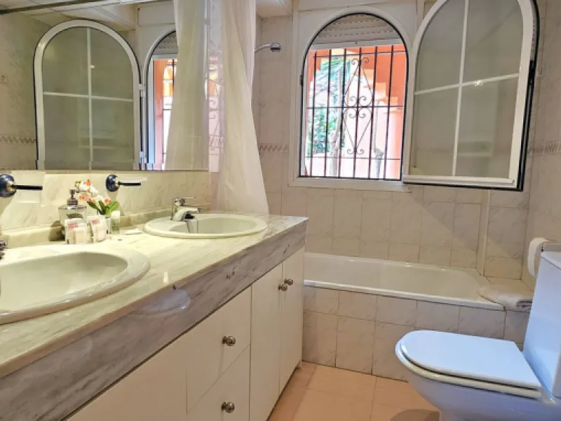 Fantastic, spacious and bright seaside elevated ground floor corner apartment, in a beachfront residential complex, located on one of the best beaches in Marbella. It features a large, very pleasant terrace that surrounds the entire property, perfect for 