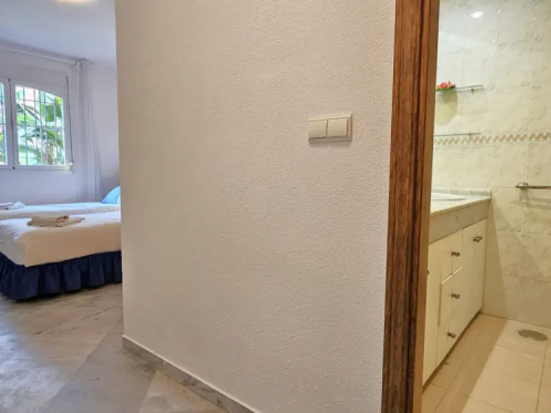 Fantastic, spacious and bright seaside elevated ground floor corner apartment, in a beachfront residential complex, located on one of the best beaches in Marbella. It features a large, very pleasant terrace that surrounds the entire property, perfect for 