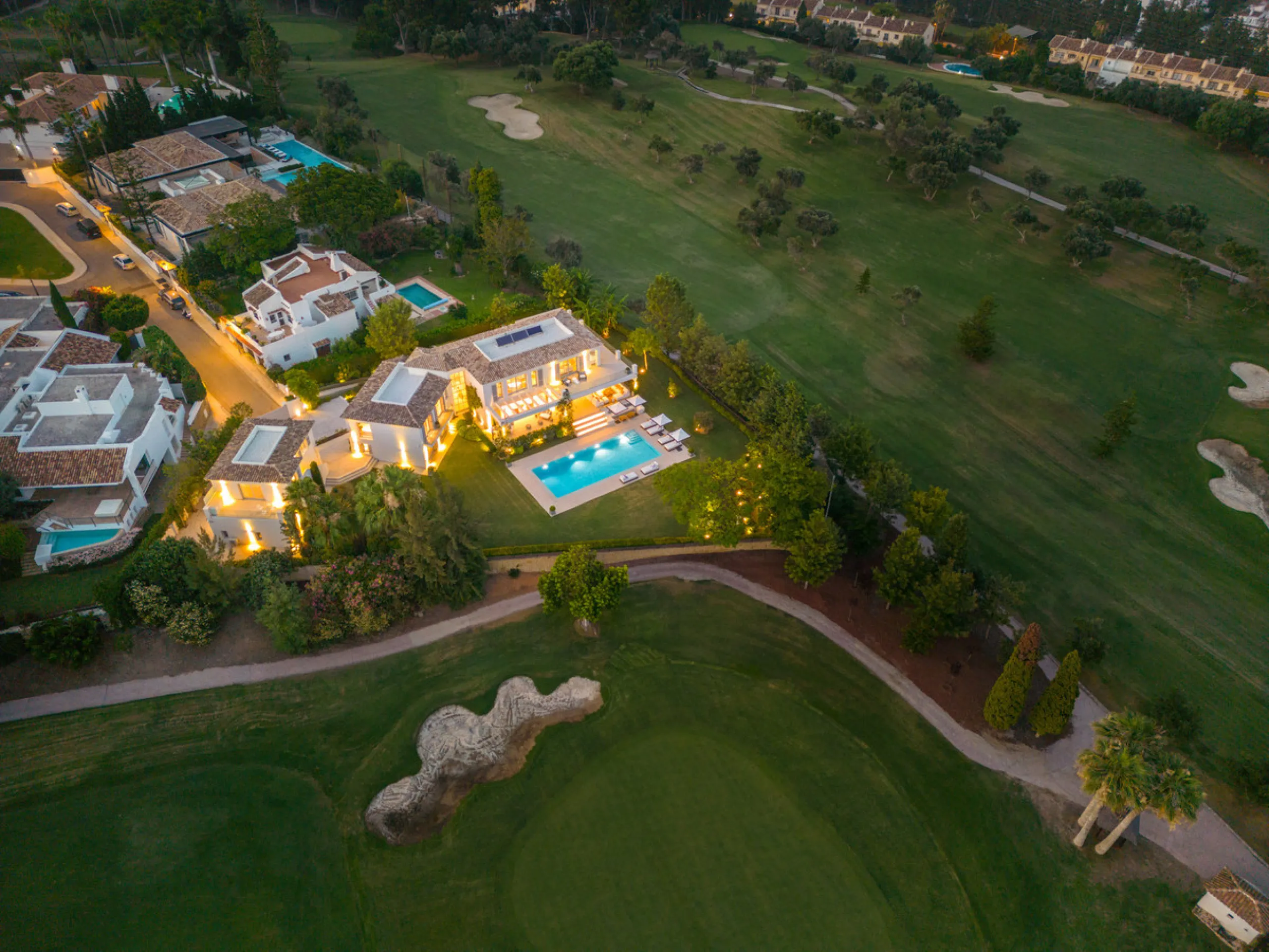 Beautiful villa located in a private oasis in the luxurious Aloha area of Marbella's Golf Valley. This magnificent property sits in a prestigious gated community and boasts an enviable front-line position overlooking Aloha Golf Course. The villa comprises