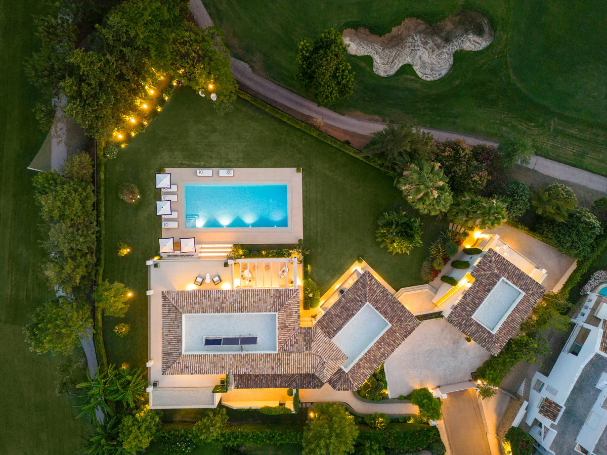 Beautiful villa located in a private oasis in the luxurious Aloha area of Marbella's Golf Valley. This magnificent property sits in a prestigious gated community and boasts an enviable front-line position overlooking Aloha Golf Course. The villa comprises