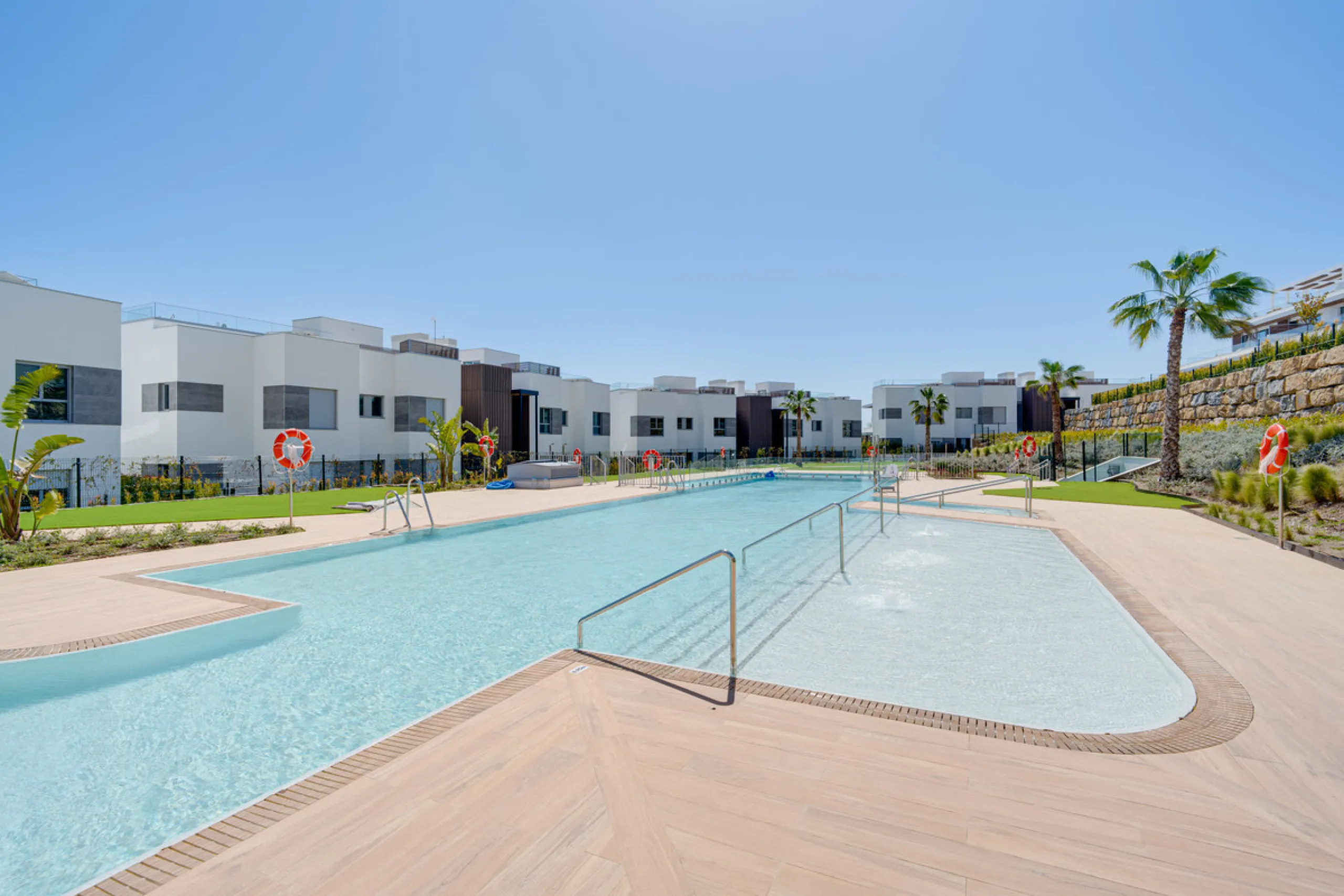 This magnificent ground-floor duplex apartment is located in Santa Clara, Marbella East, perfectly positioned close to the hospital, shops, golf courses, schools, and the beach. The property seamlessly blends indoor and outdoor living, featuring a private
