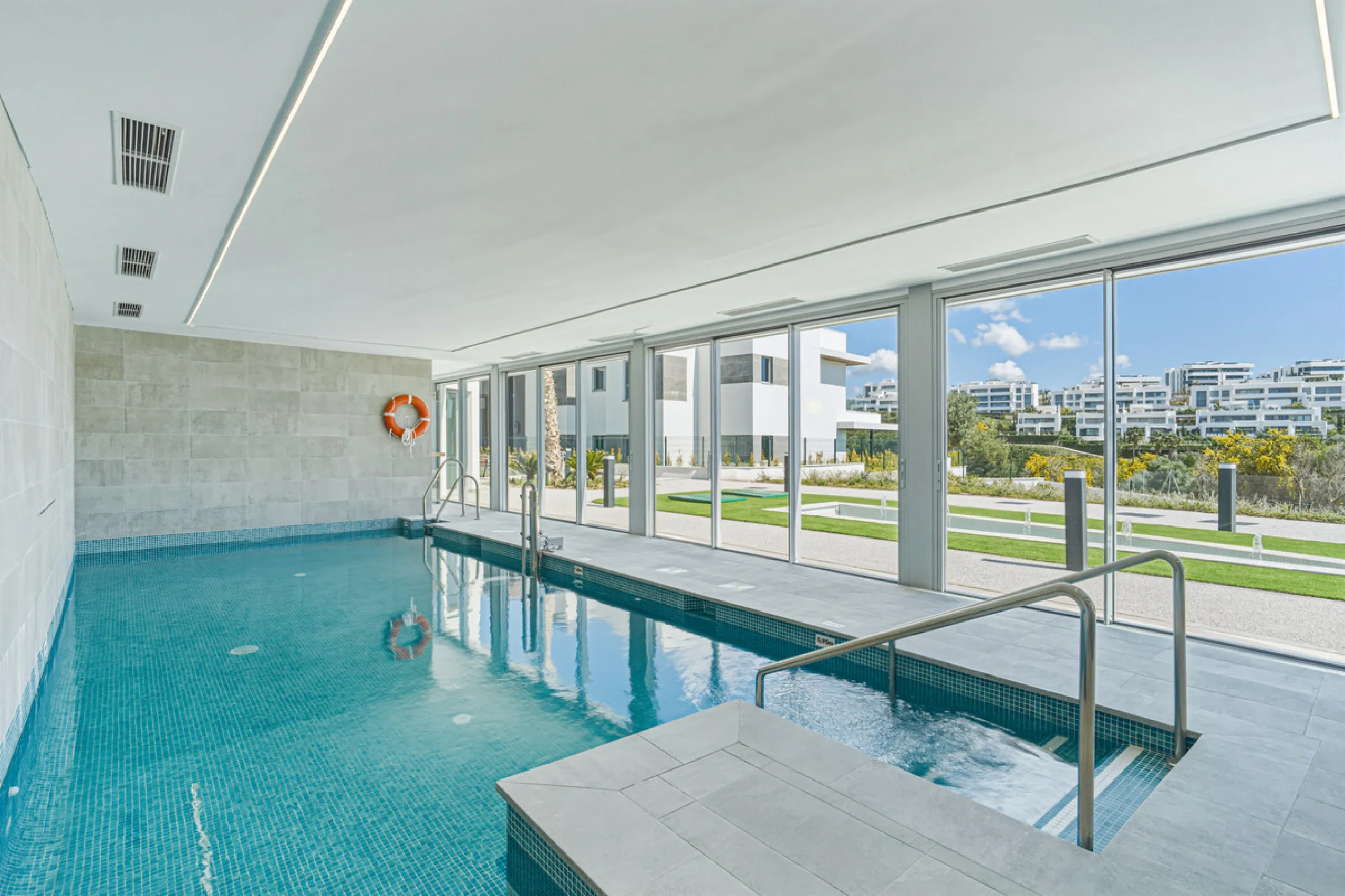 This magnificent ground-floor duplex apartment is located in Santa Clara, Marbella East, perfectly positioned close to the hospital, shops, golf courses, schools, and the beach. The property seamlessly blends indoor and outdoor living, featuring a private