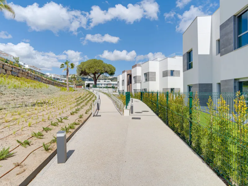 This magnificent ground-floor duplex apartment is located in Santa Clara, Marbella East, perfectly positioned close to the hospital, shops, golf courses, schools, and the beach. The property seamlessly blends indoor and outdoor living, featuring a private