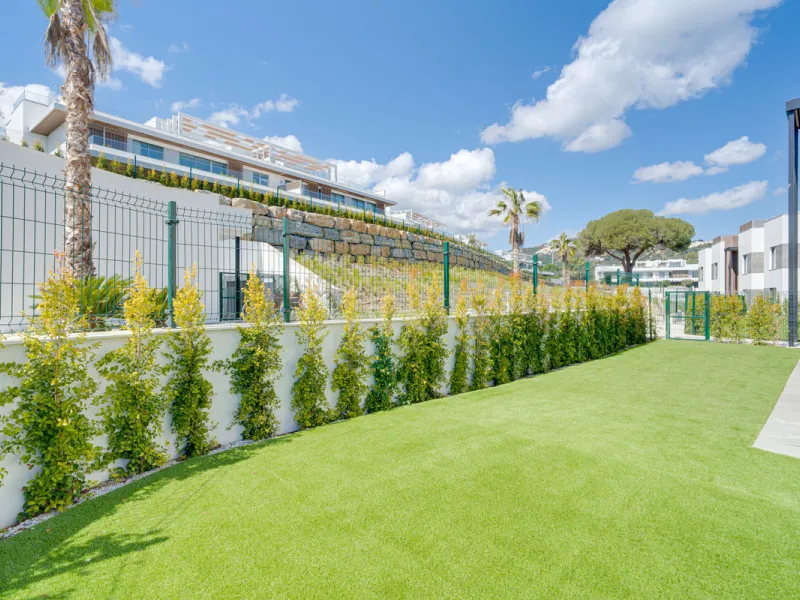 This magnificent ground-floor duplex apartment is located in Santa Clara, Marbella East, perfectly positioned close to the hospital, shops, golf courses, schools, and the beach. The property seamlessly blends indoor and outdoor living, featuring a private