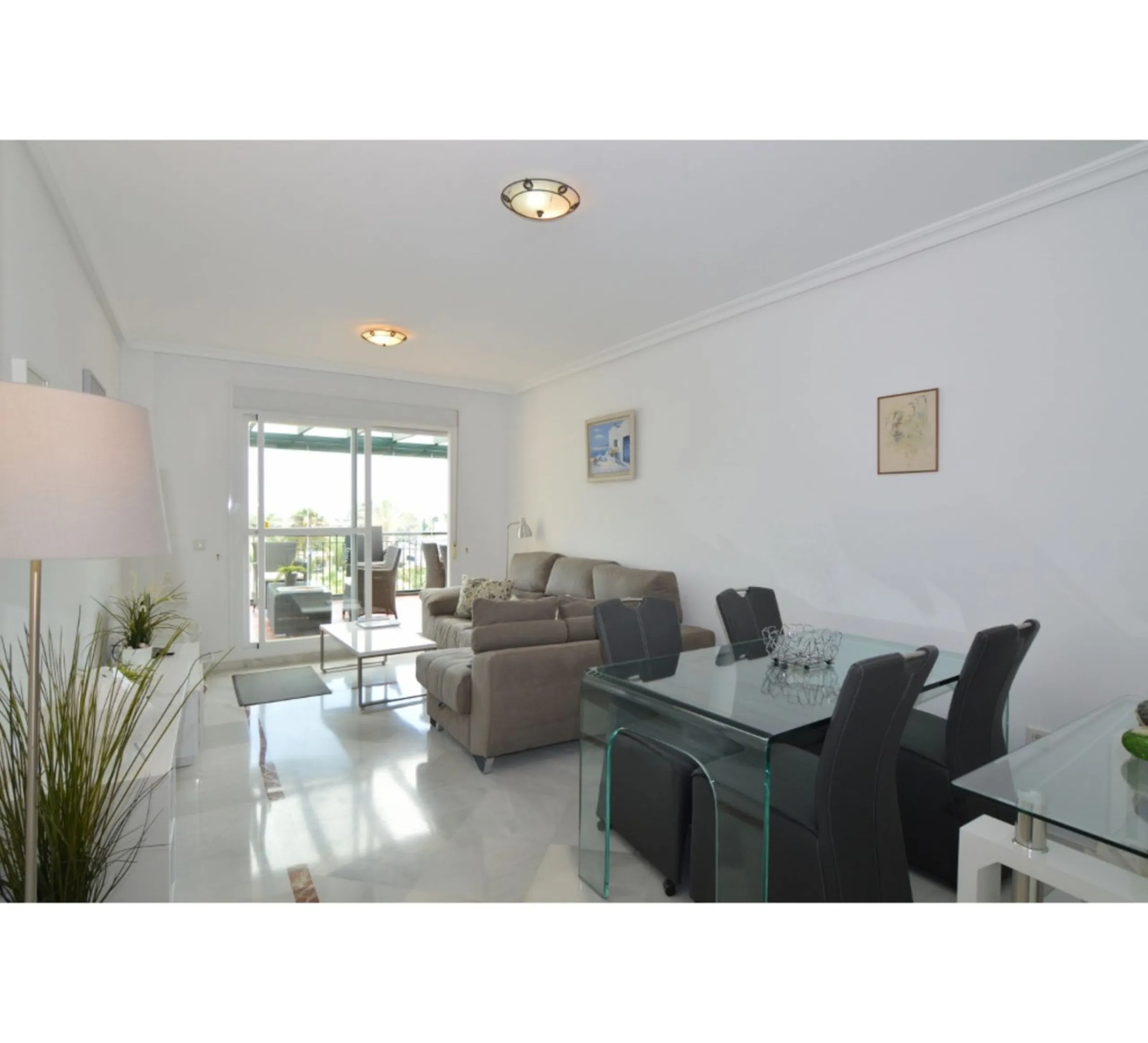 MARBELLA, Nueva Andalucía | South Facing -Top-Floor Apartment | 2 Bed · 2 Bath | Large Sunny Terrace