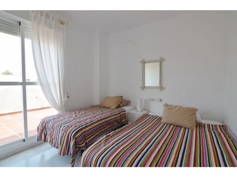 MARBELLA, Nueva Andalucía | South Facing -Top-Floor Apartment | 2 Bed · 2 Bath | Large Sunny Terrace