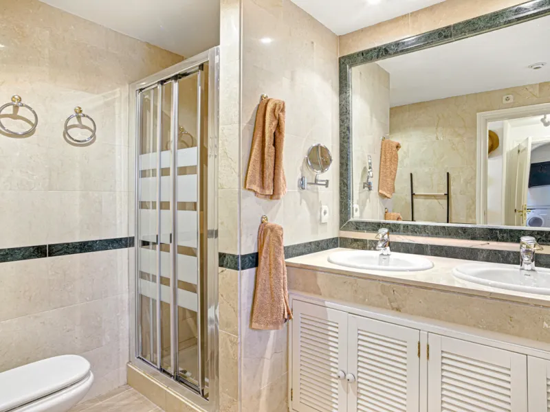 Beautiful south-facing, two-bedroom apartment located in the prestigious Hacienda Playa, Elviria. Designed for comfortable coastal living and filled with natural light, the property features two large bedrooms, two bathrooms and a fully equipped kitchen, 