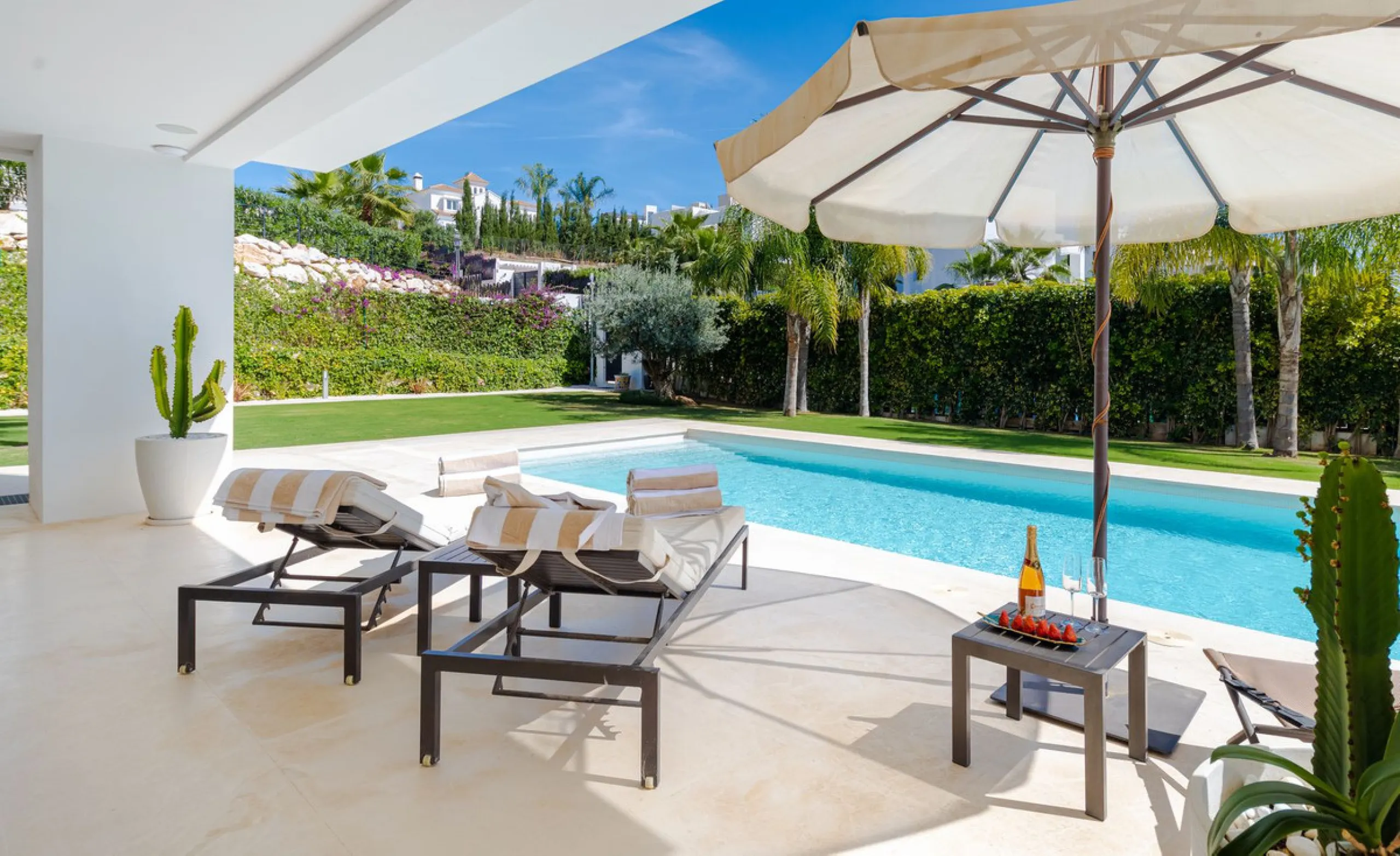 Located within an exclusive, fully gated residential community with 24-hour security, this outstanding contemporary villa occupies the largest plot in the development, offering exceptional privacy, generous space, and a prime setting. Set on an expansive 