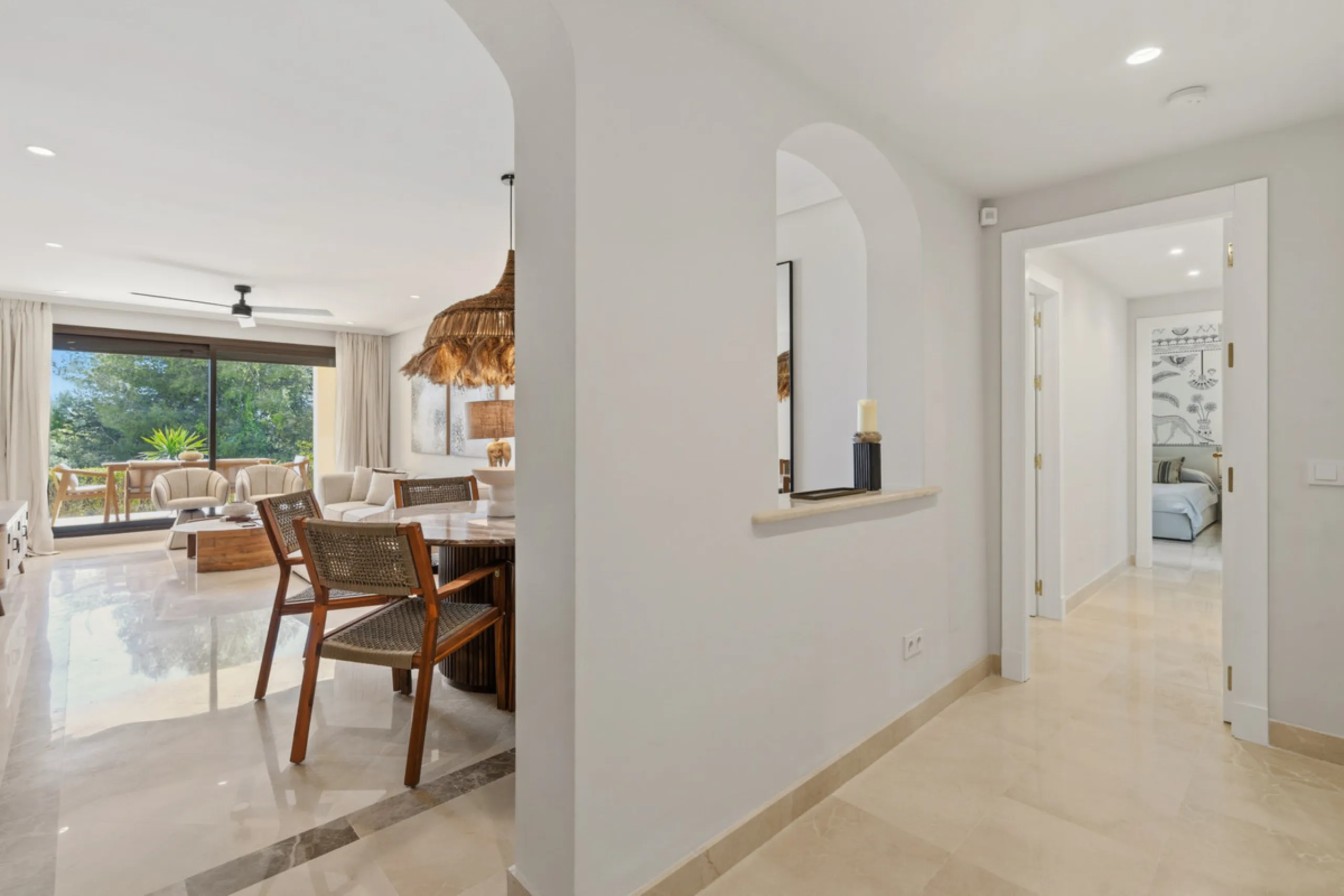 Discover this bright and elegant 3-bedroom, 2-bathroom ground floor apartment located in the sought-after Los Pinos community within Los Arqueros Golf & Country Club.
