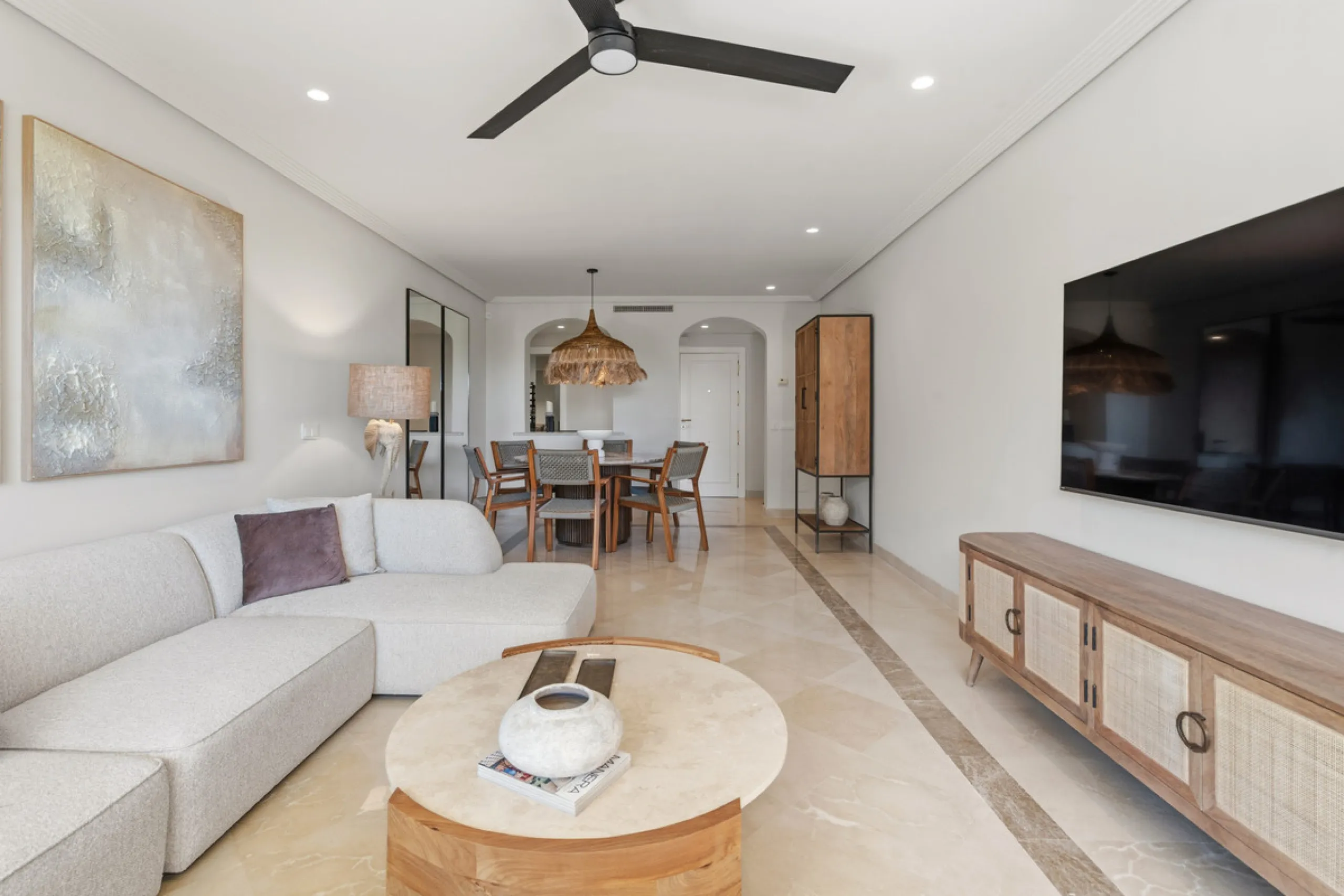 Discover this bright and elegant 3-bedroom, 2-bathroom ground floor apartment located in the sought-after Los Pinos community within Los Arqueros Golf & Country Club.