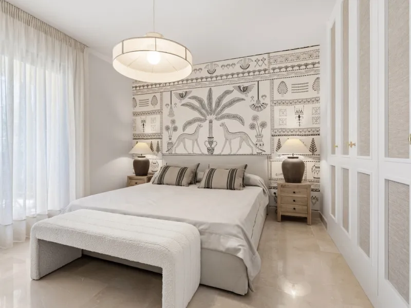 Discover this bright and elegant 3-bedroom, 2-bathroom ground floor apartment located in the sought-after Los Pinos community within Los Arqueros Golf & Country Club.