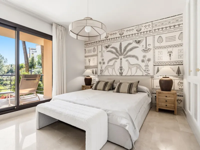 Discover this bright and elegant 3-bedroom, 2-bathroom ground floor apartment located in the sought-after Los Pinos community within Los Arqueros Golf & Country Club.