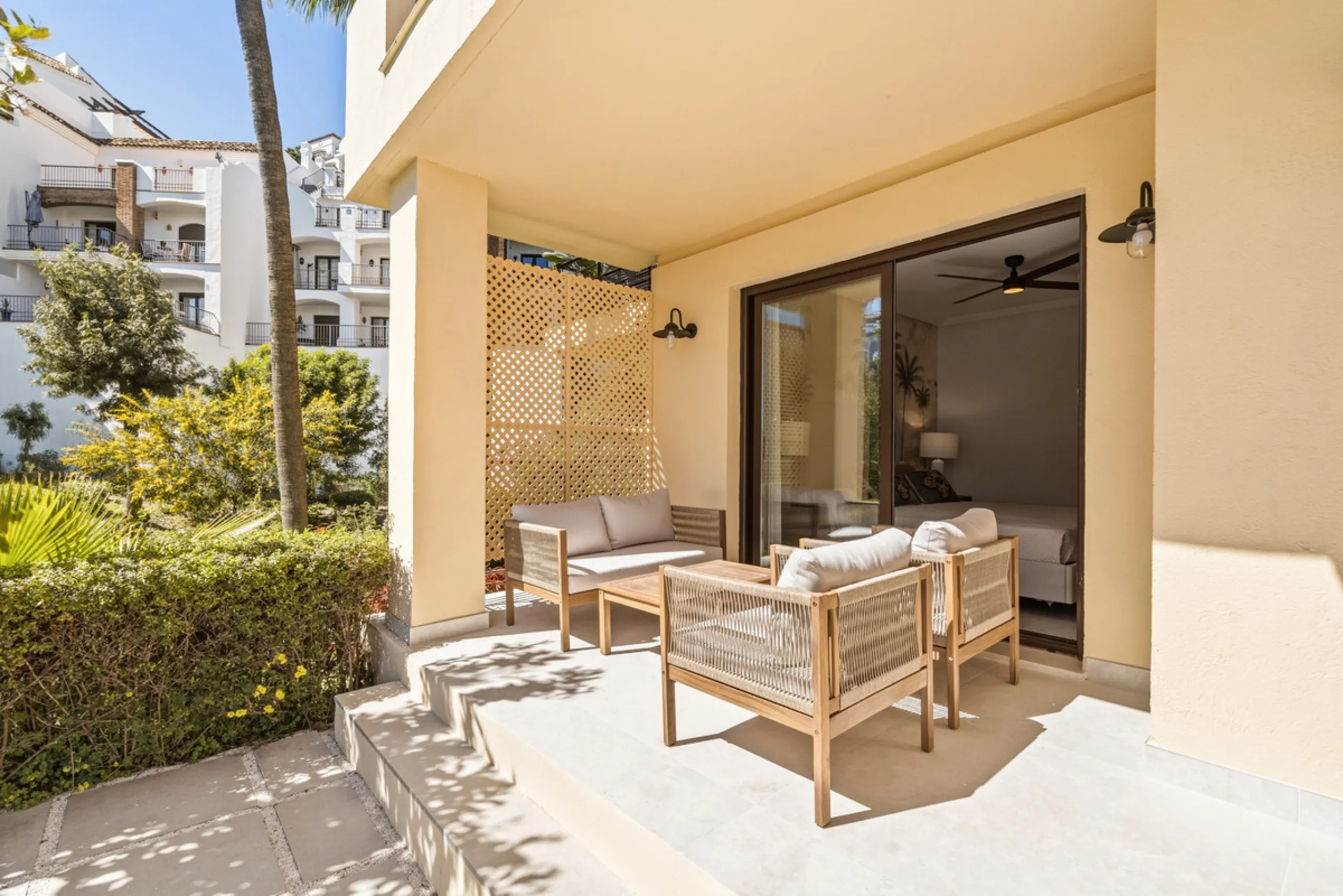 Discover this bright and elegant 3-bedroom, 2-bathroom ground floor apartment located in the sought-after Los Pinos community within Los Arqueros Golf & Country Club.