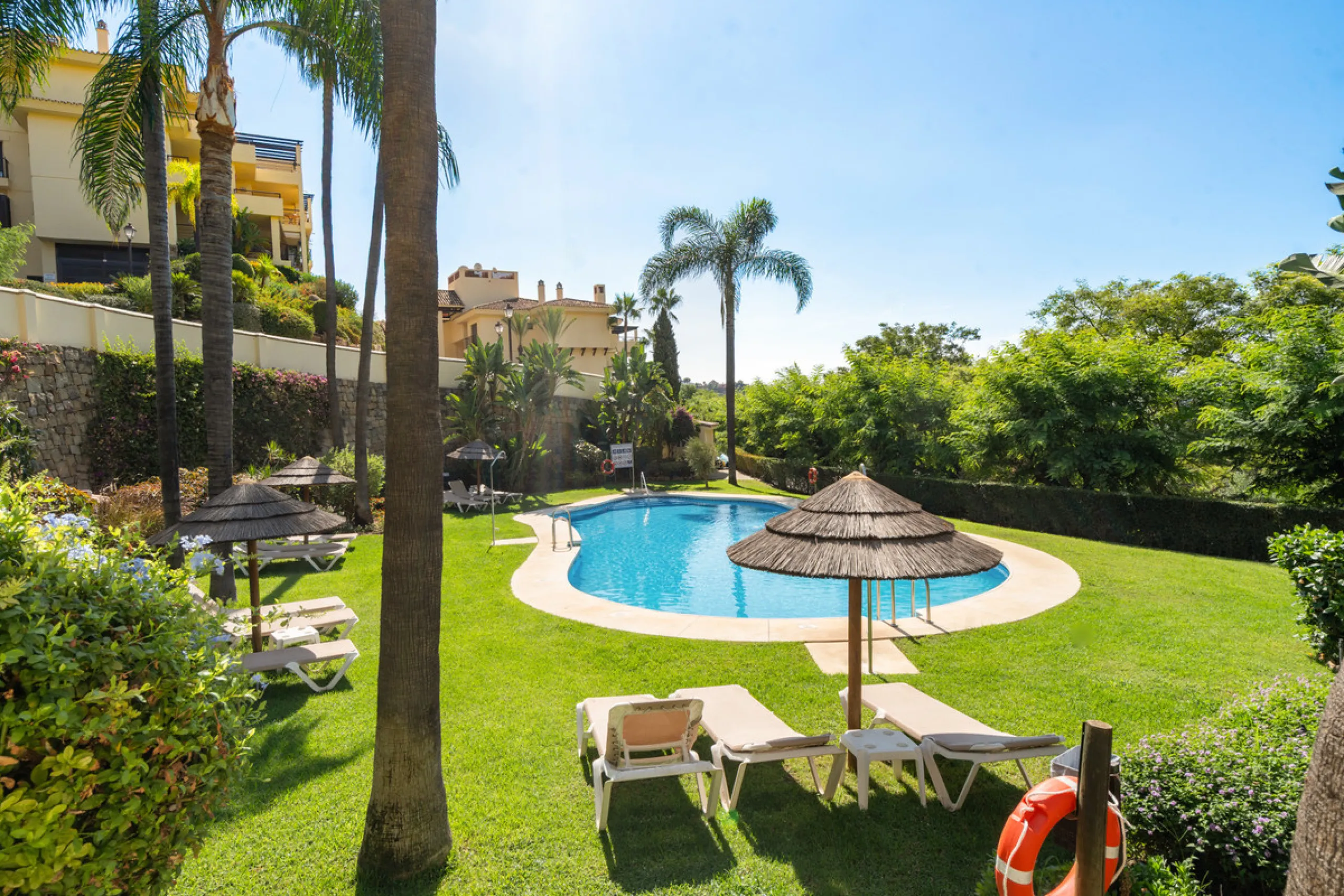 Discover this bright and elegant 3-bedroom, 2-bathroom ground floor apartment located in the sought-after Los Pinos community within Los Arqueros Golf & Country Club.