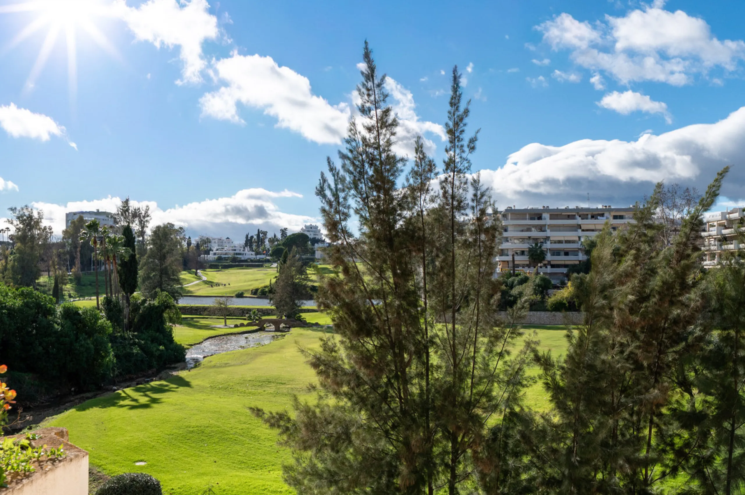 This beautifully refurbished yet thoughtfully personalised two-bedroom, two-bathroom apartment is set within the sought-after gated community of Campos de Guadalmina, offering open golf views from every bedroom.