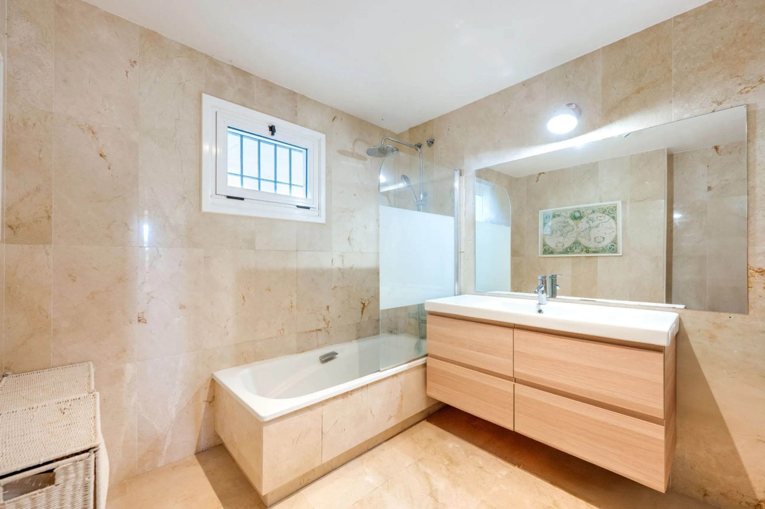 This beautifully refurbished yet thoughtfully personalised two-bedroom, two-bathroom apartment is set within the sought-after gated community of Campos de Guadalmina, offering open golf views from every bedroom.