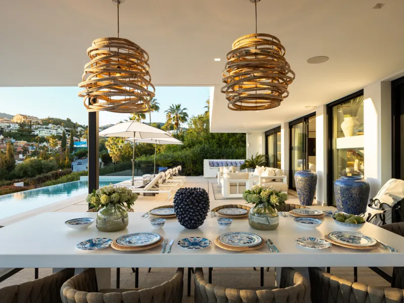 Contemporary villa set in the heart of Nueva Andalucía's prestigious Golf Valley, enjoying a privileged west-facing orientation overlooking the renowned Los Naranjos Golf Course. Distributed across three levels, the residence captures sweeping views of ma