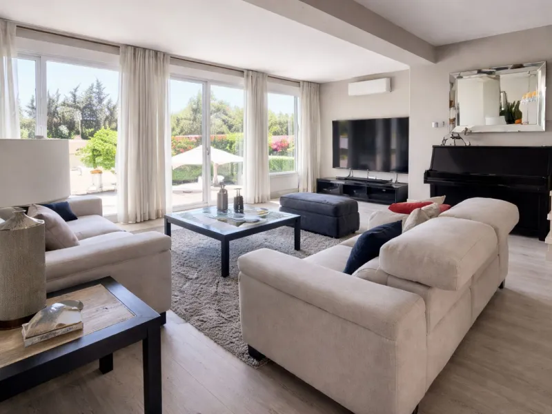 Stunning 6-bedroom, 6-bathroom detached villa located in a secure, gated community just a 10-minute walk from the beach and moments from the heart of Marbella.