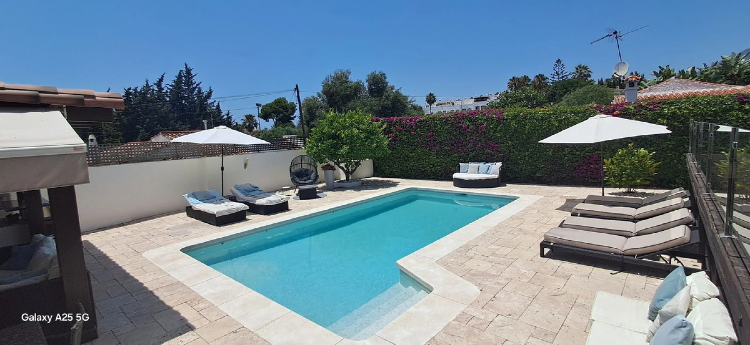 Stunning 6-bedroom, 6-bathroom detached villa located in a secure, gated community just a 10-minute walk from the beach and moments from the heart of Marbella.