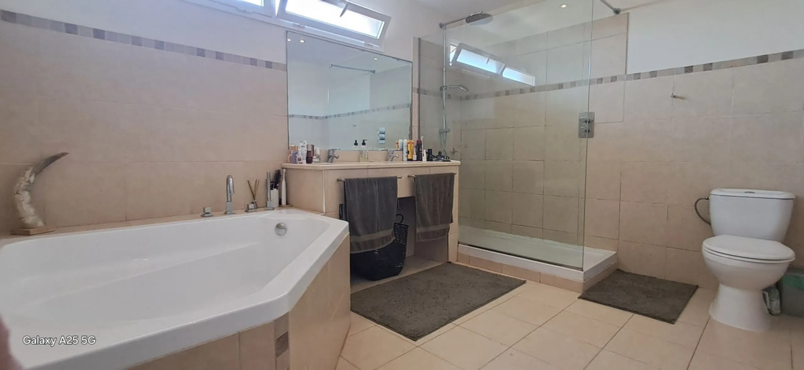 Stunning 6-bedroom, 6-bathroom detached villa located in a secure, gated community just a 10-minute walk from the beach and moments from the heart of Marbella.