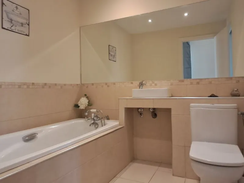 Stunning 6-bedroom, 6-bathroom detached villa located in a secure, gated community just a 10-minute walk from the beach and moments from the heart of Marbella.