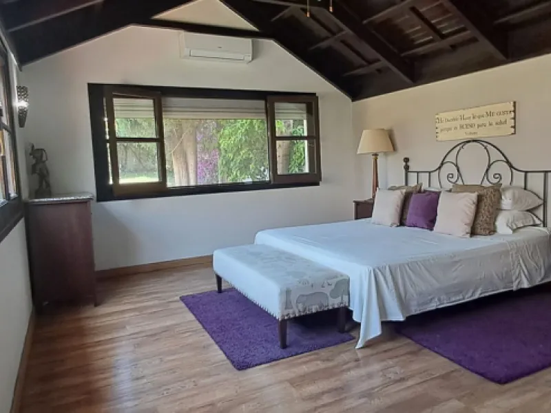 Stunning 6-bedroom, 6-bathroom detached villa located in a secure, gated community just a 10-minute walk from the beach and moments from the heart of Marbella.