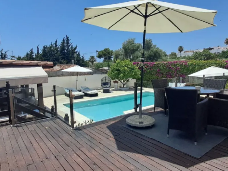 Stunning 6-bedroom, 6-bathroom detached villa located in a secure, gated community just a 10-minute walk from the beach and moments from the heart of Marbella.