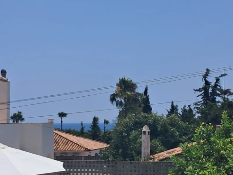 Stunning 6-bedroom, 6-bathroom detached villa located in a secure, gated community just a 10-minute walk from the beach and moments from the heart of Marbella.