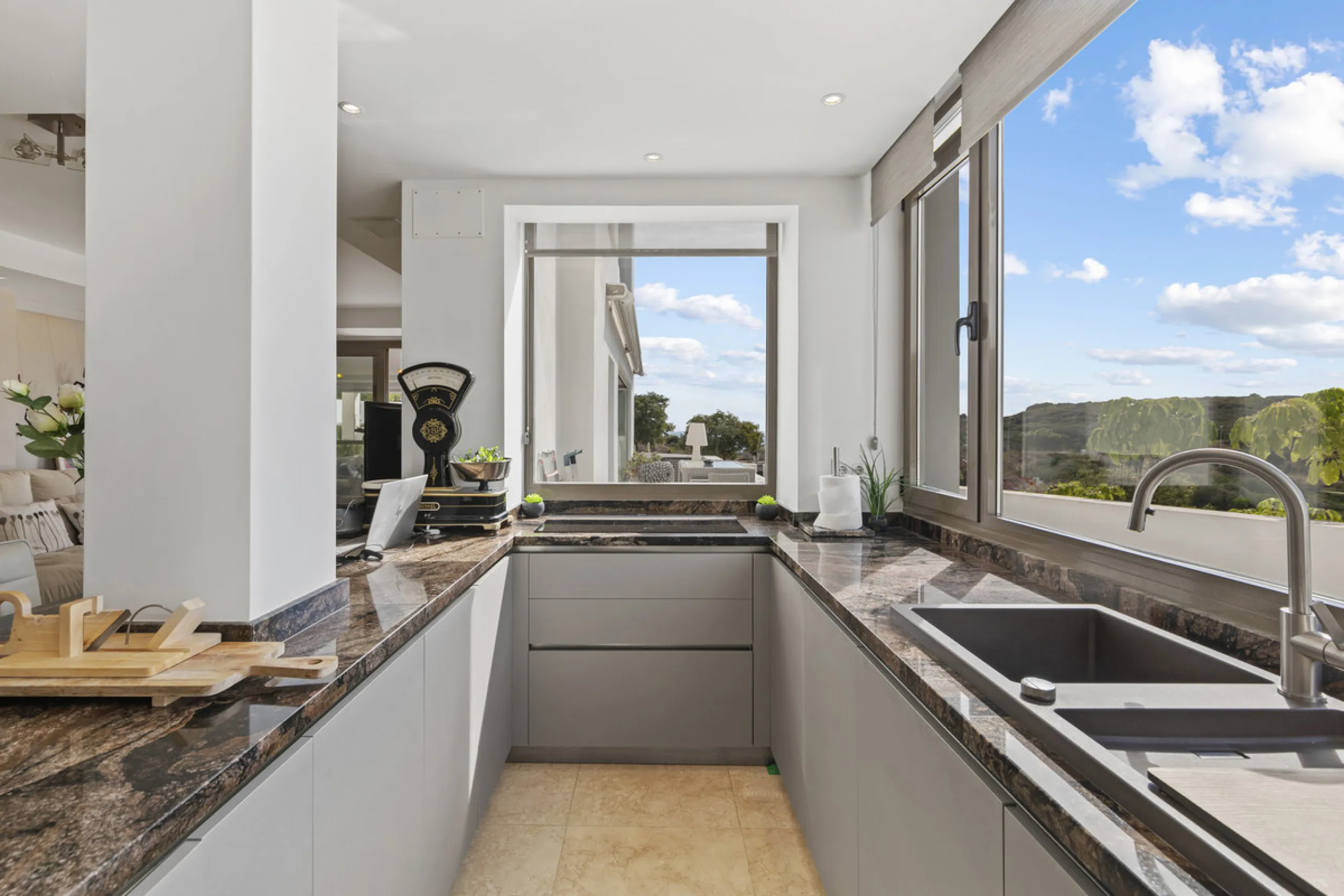 Set in an elevated position within the exclusive Finca Cortesin resort, this exceptional 2 bedroom, 2 bathroom ground-floor apartment epitomises contemporary luxury and refined Mediterranean living.