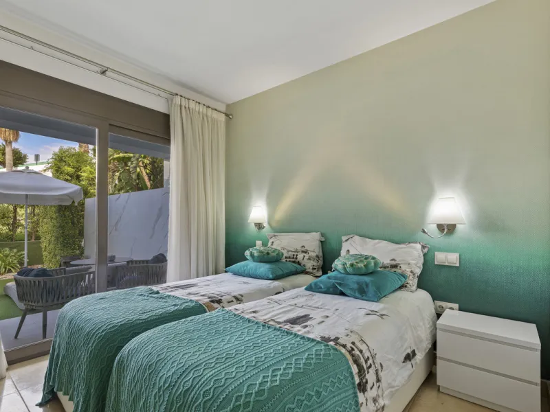 Set in an elevated position within the exclusive Finca Cortesin resort, this exceptional 2 bedroom, 2 bathroom ground-floor apartment epitomises contemporary luxury and refined Mediterranean living.