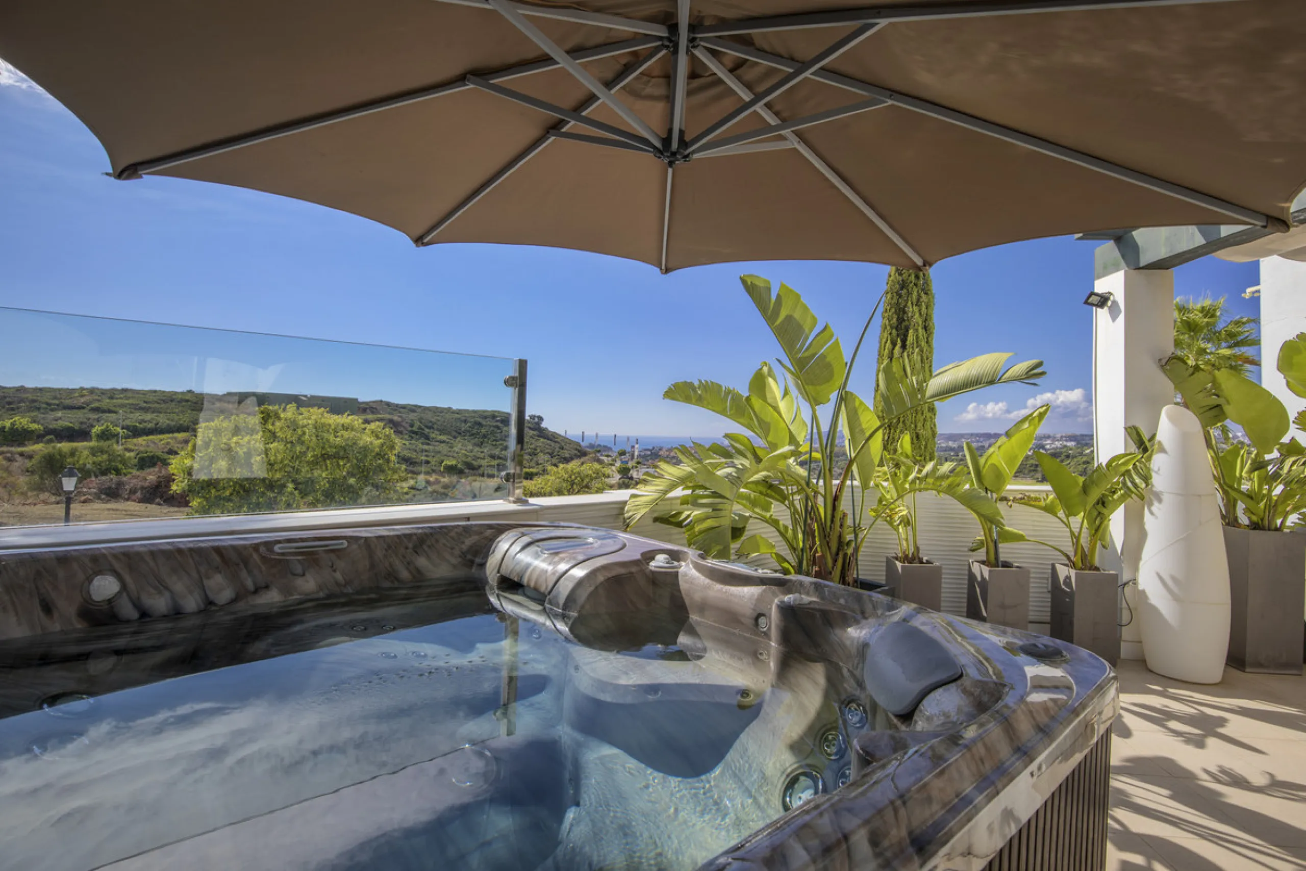 Set in an elevated position within the exclusive Finca Cortesin resort, this exceptional 2 bedroom, 2 bathroom ground-floor apartment epitomises contemporary luxury and refined Mediterranean living.