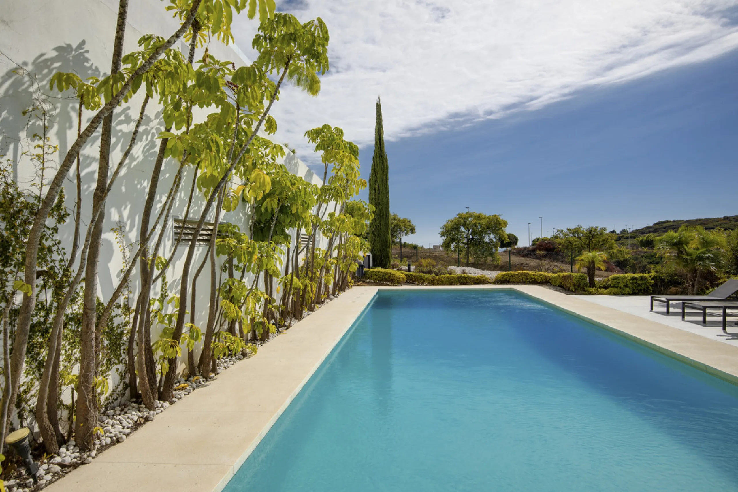 Set in an elevated position within the exclusive Finca Cortesin resort, this exceptional 2 bedroom, 2 bathroom ground-floor apartment epitomises contemporary luxury and refined Mediterranean living.
