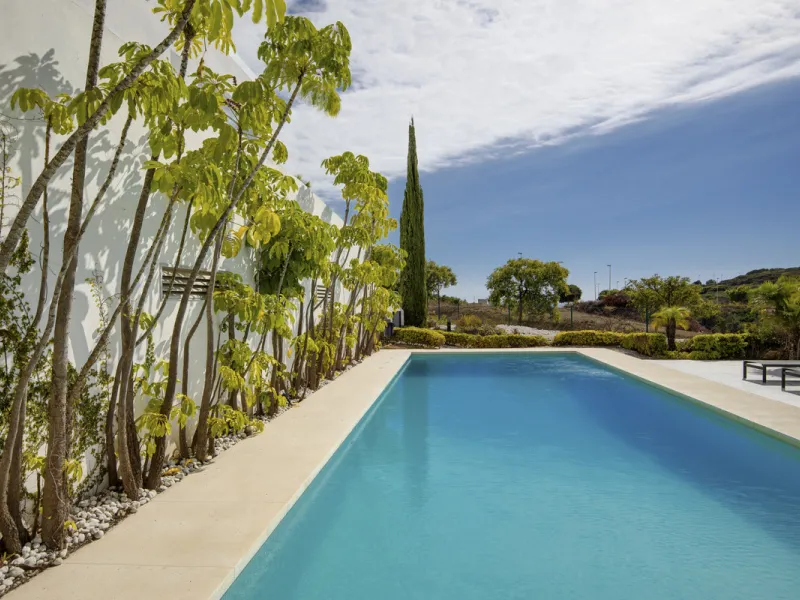 Set in an elevated position within the exclusive Finca Cortesin resort, this exceptional 2 bedroom, 2 bathroom ground-floor apartment epitomises contemporary luxury and refined Mediterranean living.