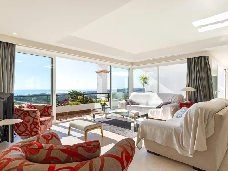 This is a beautifully presented three-bedroom penthouse with breathtaking sea, mountain and golf views, located in a sought-after development in Doña Julia, Casares.