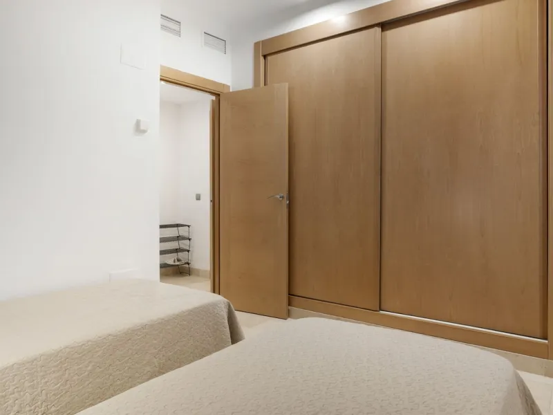 We are proud to present this luxurious ground-floor apartment, located within an exclusive gated and secure community renowned for its abundance of swimming pools and beautifully maintained green spaces.