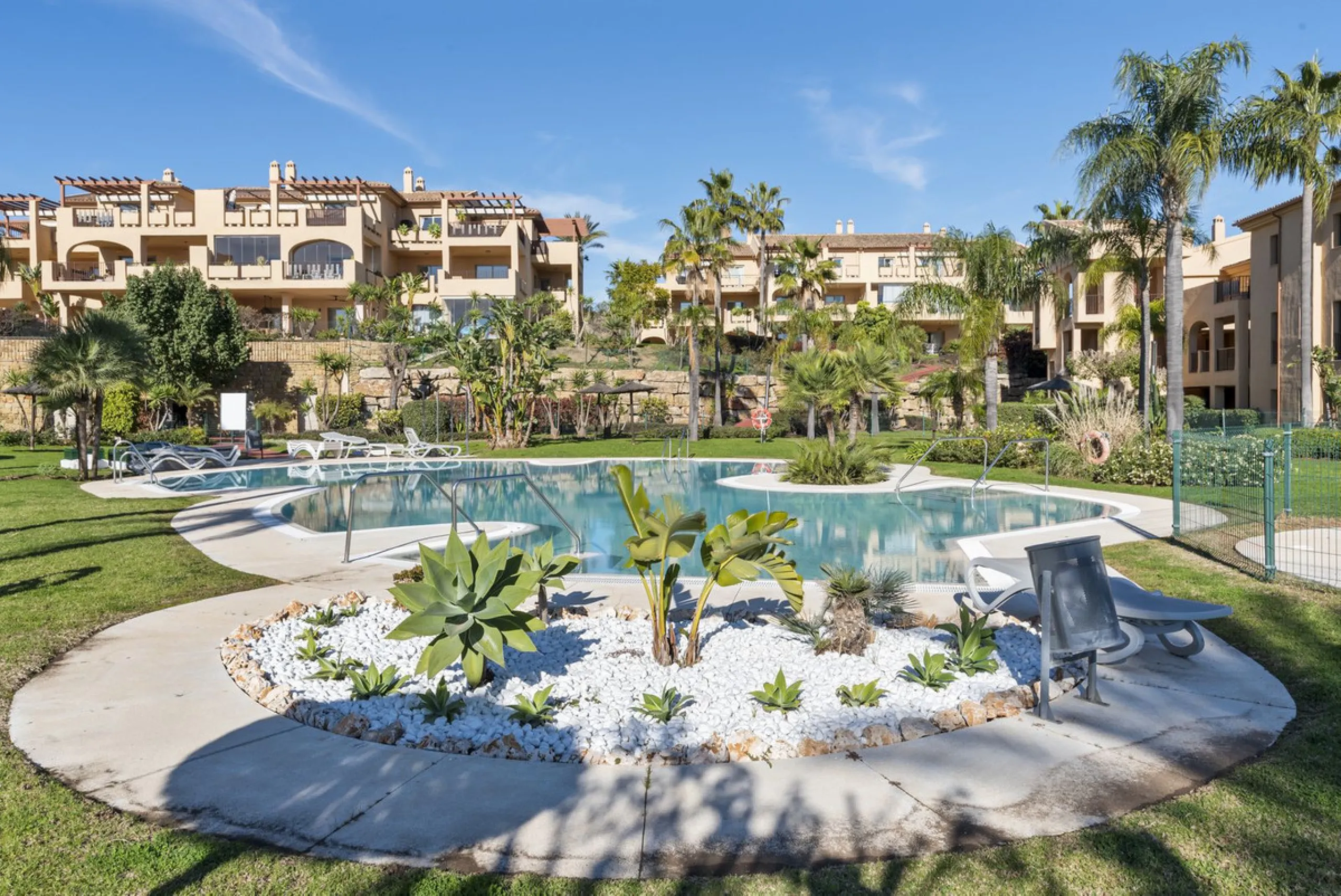 We are proud to present this luxurious ground-floor apartment, located within an exclusive gated and secure community renowned for its abundance of swimming pools and beautifully maintained green spaces.