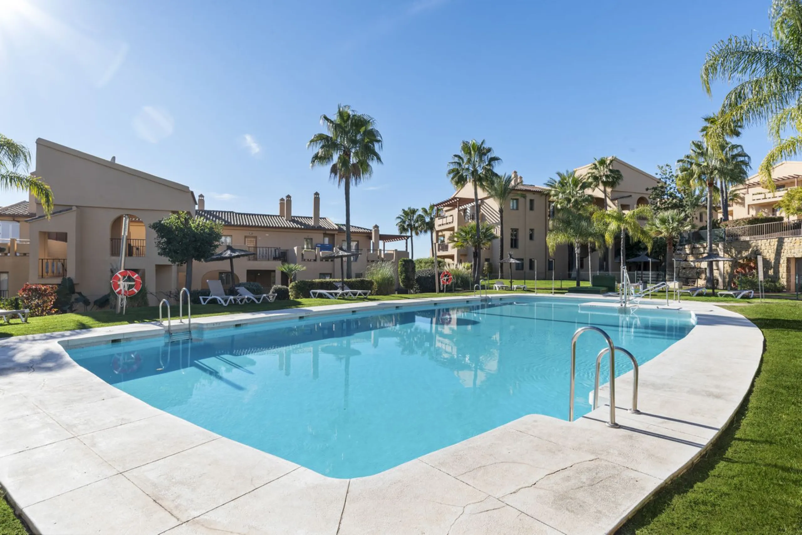 We are proud to present this luxurious ground-floor apartment, located within an exclusive gated and secure community renowned for its abundance of swimming pools and beautifully maintained green spaces.