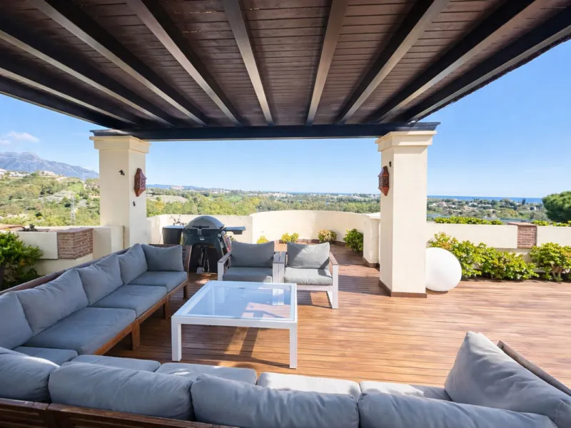 Exceptional penthouse with magnificent panoramic views of the sea, mountains and surrounding golf course.  A Private  Retreat in One of the Costa del Sol's Most Prestigious Developments