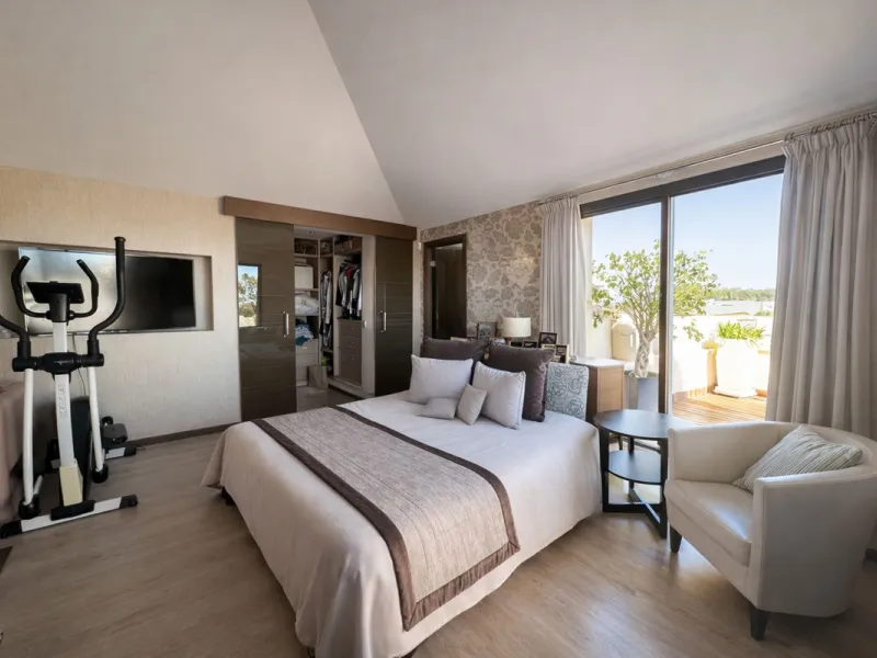 Exceptional penthouse with magnificent panoramic views of the sea, mountains and surrounding golf course.  A Private  Retreat in One of the Costa del Sol's Most Prestigious Developments