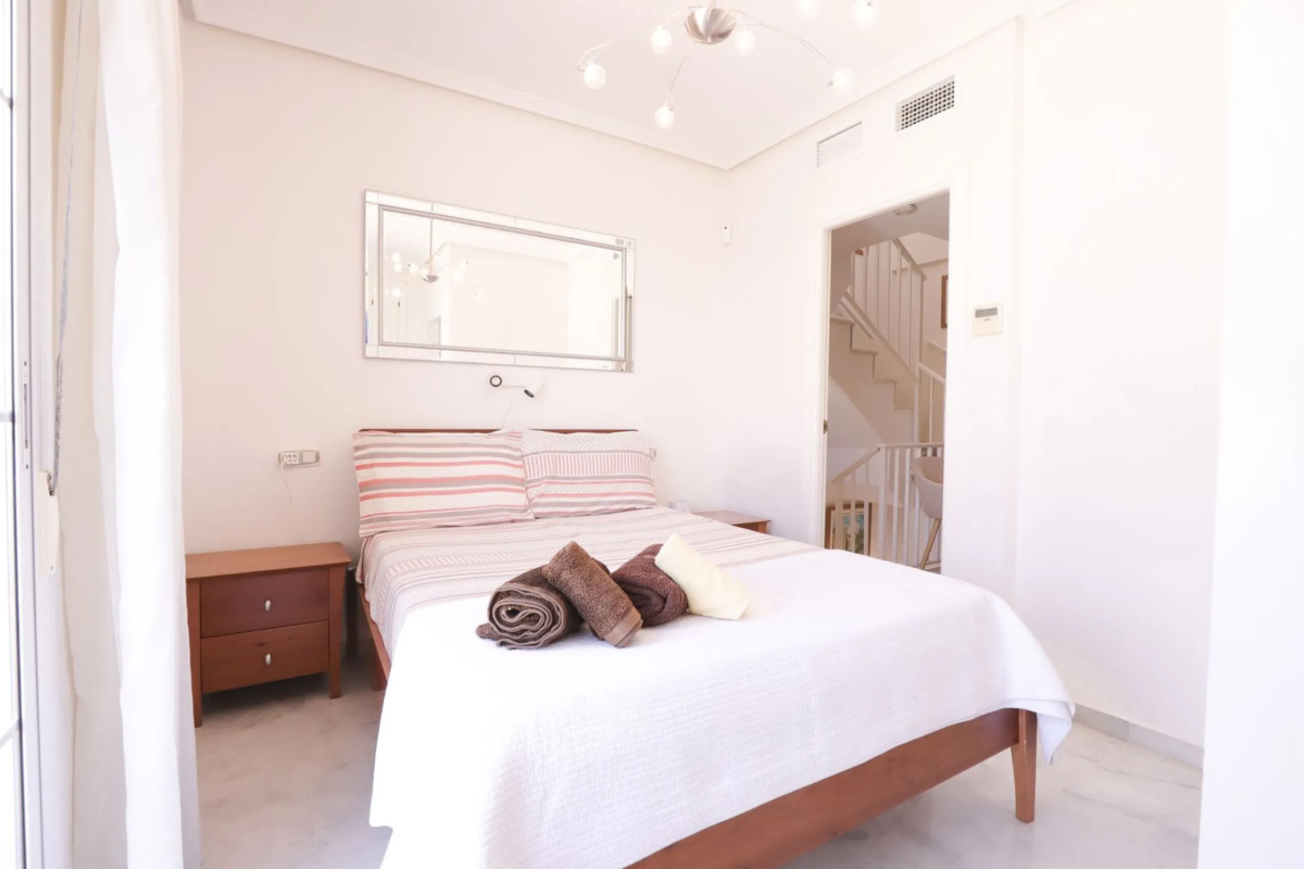 A rare opportunity to invest in a fully-furnished, 3-bedroom townhouse with a fully-transferable holiday rental license, allowing you to enjoy the property personally as well as generating immediate income through short-term rentals, if desired.