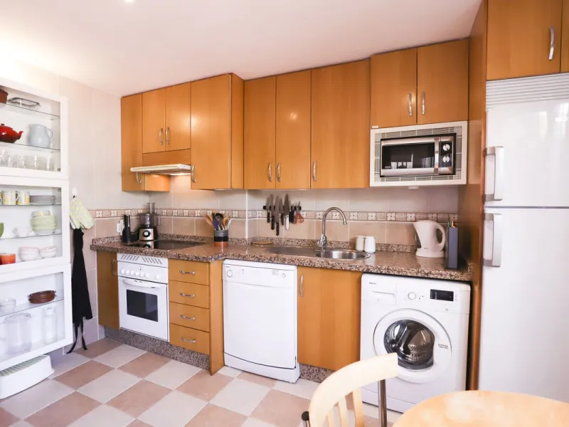 A rare opportunity to invest in a fully-furnished, 3-bedroom townhouse with a fully-transferable holiday rental license, allowing you to enjoy the property personally as well as generating immediate income through short-term rentals, if desired.