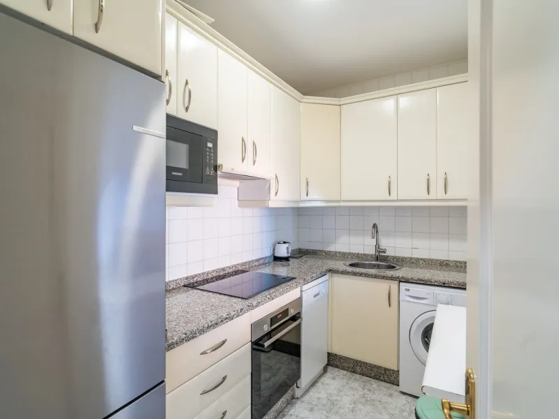 Discover this pristine, fully furnished 1-bedroom apartment in the iconic Edificio Perla 5, ideally positioned frontline beach in the very heart of Fuengirola, Málaga. Priced at €322,500, this residence offers spectacular beach and city views, combining M