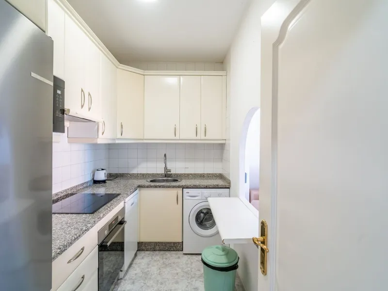 Discover this pristine, fully furnished 1-bedroom apartment in the iconic Edificio Perla 5, ideally positioned frontline beach in the very heart of Fuengirola, Málaga. Priced at €322,500, this residence offers spectacular beach and city views, combining M