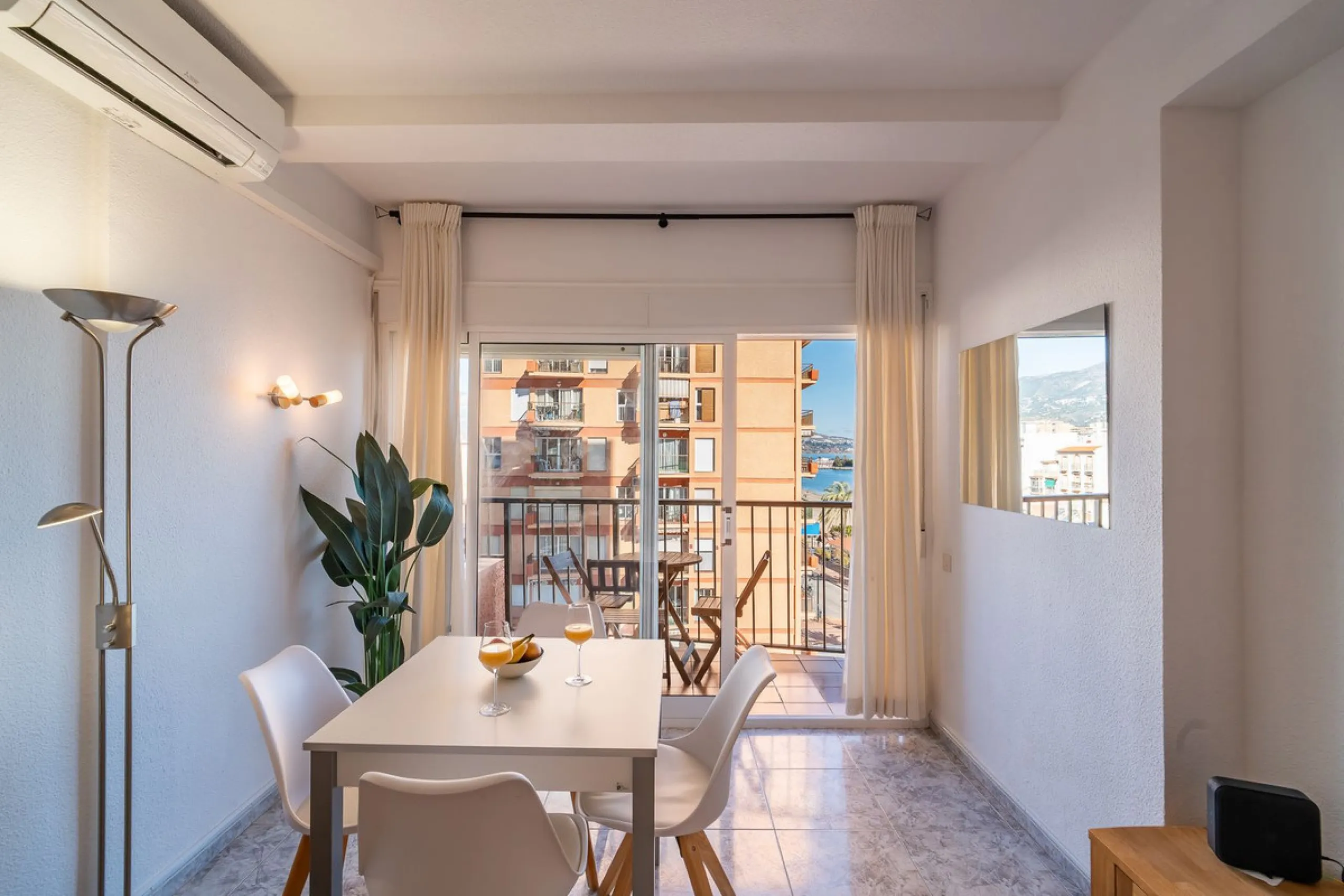 Discover this pristine, fully furnished 1-bedroom apartment in the iconic Edificio Perla 5, ideally positioned frontline beach in the very heart of Fuengirola, Málaga. Priced at €322,500, this residence offers spectacular beach and city views, combining M