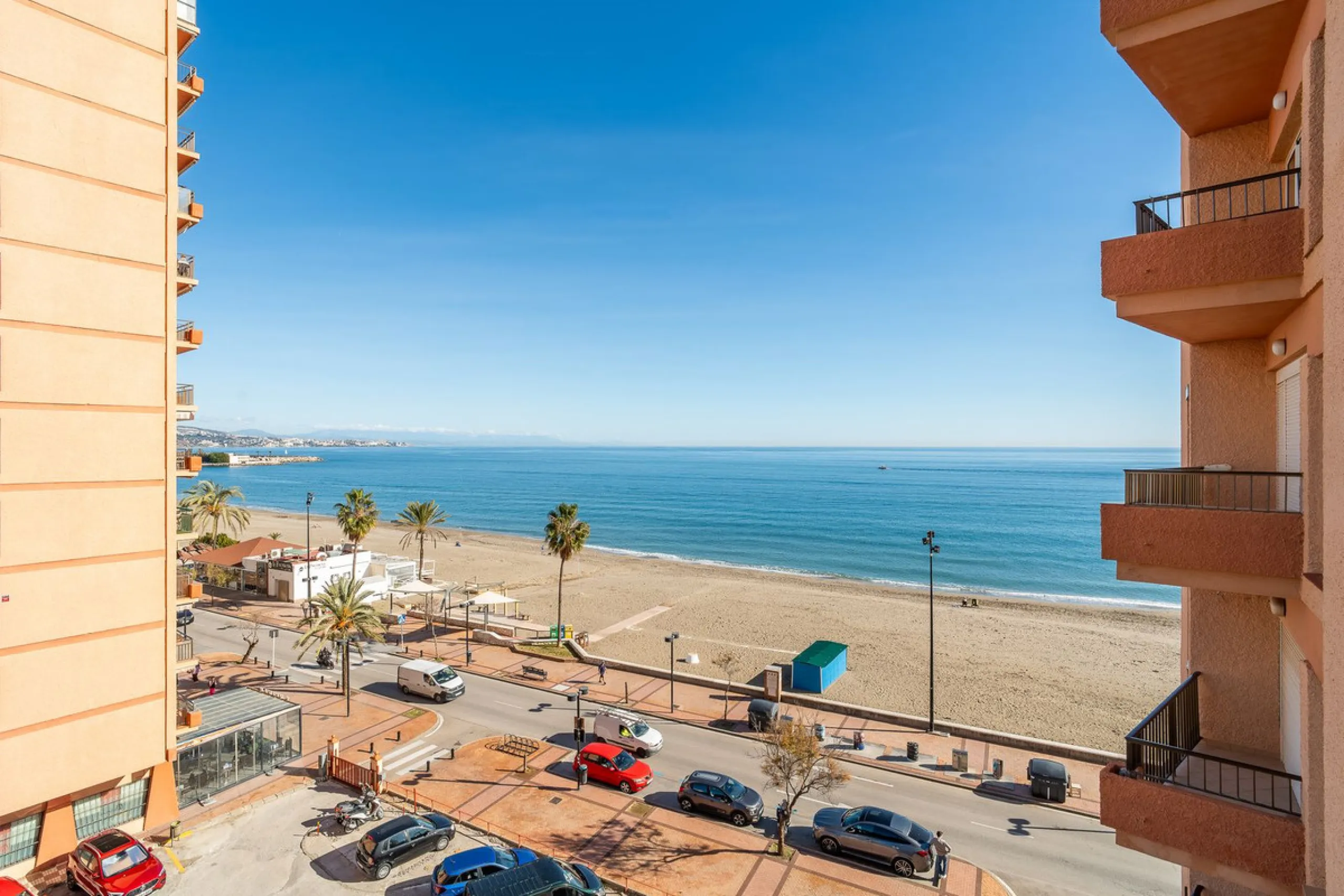Discover this pristine, fully furnished 1-bedroom apartment in the iconic Edificio Perla 5, ideally positioned frontline beach in the very heart of Fuengirola, Málaga. Priced at €322,500, this residence offers spectacular beach and city views, combining M