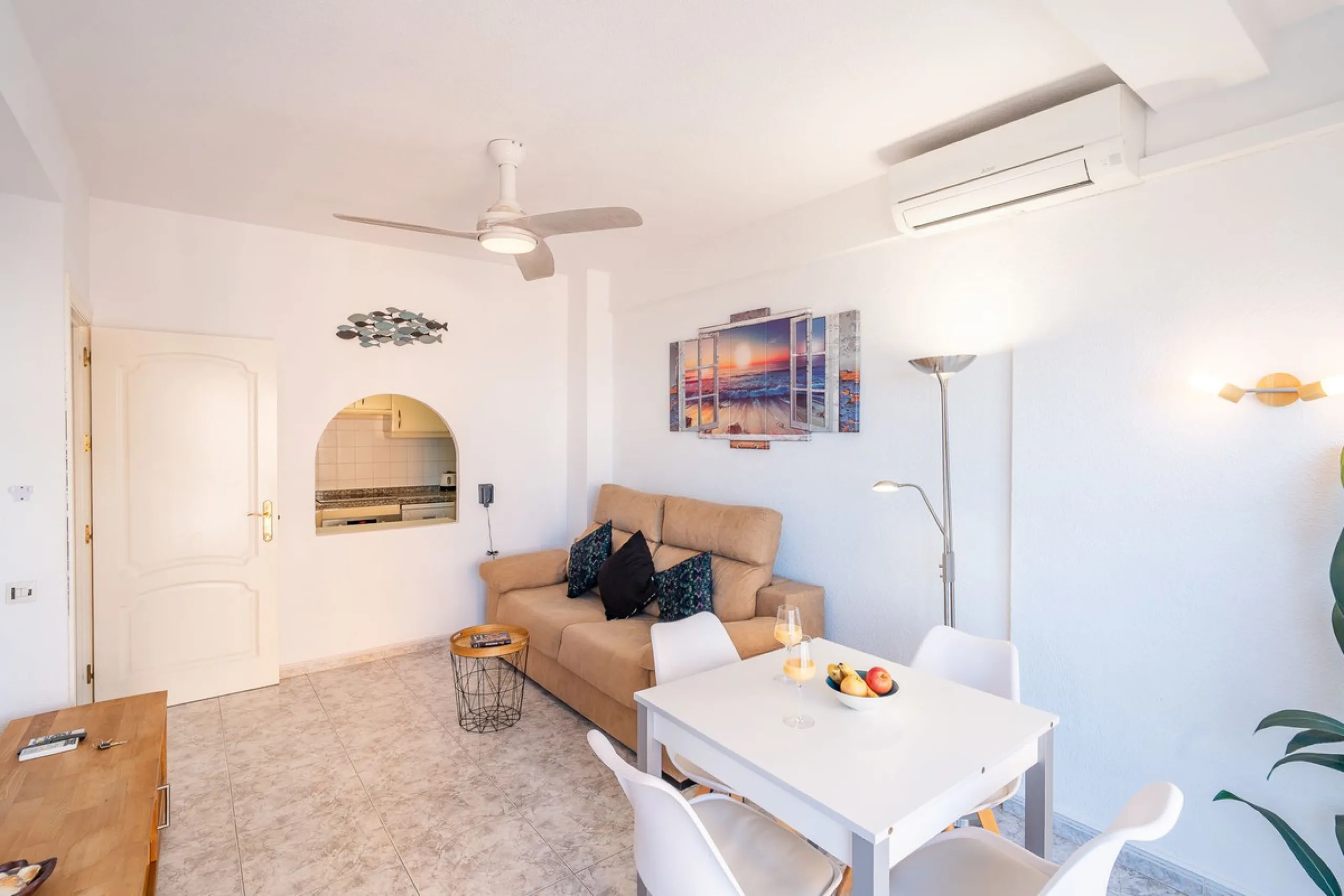 Discover this pristine, fully furnished 1-bedroom apartment in the iconic Edificio Perla 5, ideally positioned frontline beach in the very heart of Fuengirola, Málaga. Priced at €322,500, this residence offers spectacular beach and city views, combining M