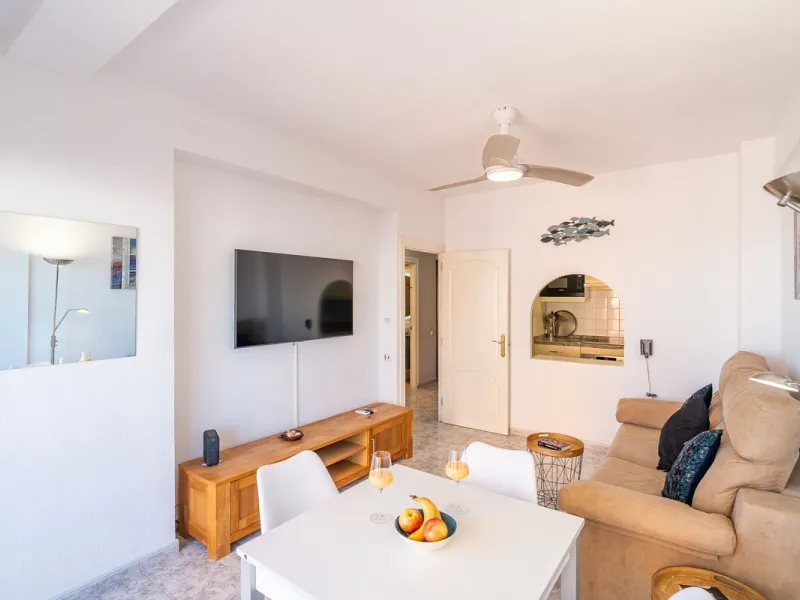 Discover this pristine, fully furnished 1-bedroom apartment in the iconic Edificio Perla 5, ideally positioned frontline beach in the very heart of Fuengirola, Málaga. Priced at €322,500, this residence offers spectacular beach and city views, combining M